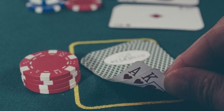Screenshot of lgosuper login live baccarat table with multilingual dealers and sportsbook sidebar showing Piala AFF and Liga 1 markets